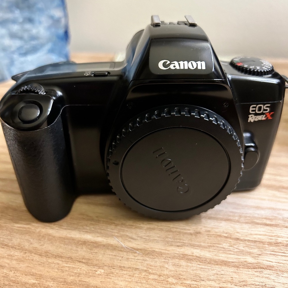 Canon 35mm SLR EOS Rebel X body, extra batteries and camera bag